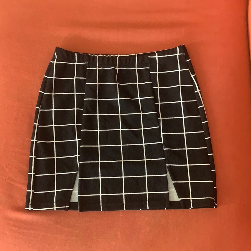 Shein black and white plaid miniskirt with slits in the front